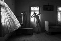 Stanko Abadic - Female Nude Peeking through Drapes
Click for more Images